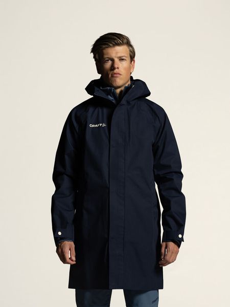 Hovedbilde OL 2l frakk i marine til herre fra Crafts OL 2026 kolleksjon